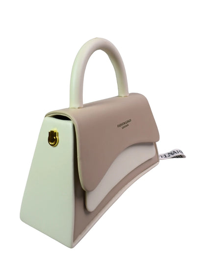 Two-tone handbag with a gold clasp on a white background